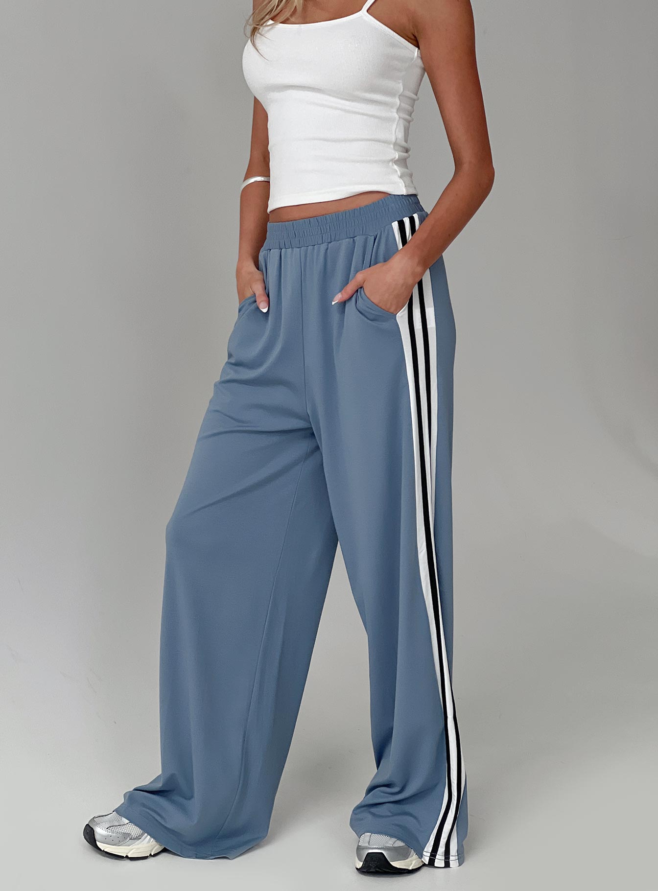 front view of model wearing Princess Polly Dime Track Pants Blue High Waisted Pants 