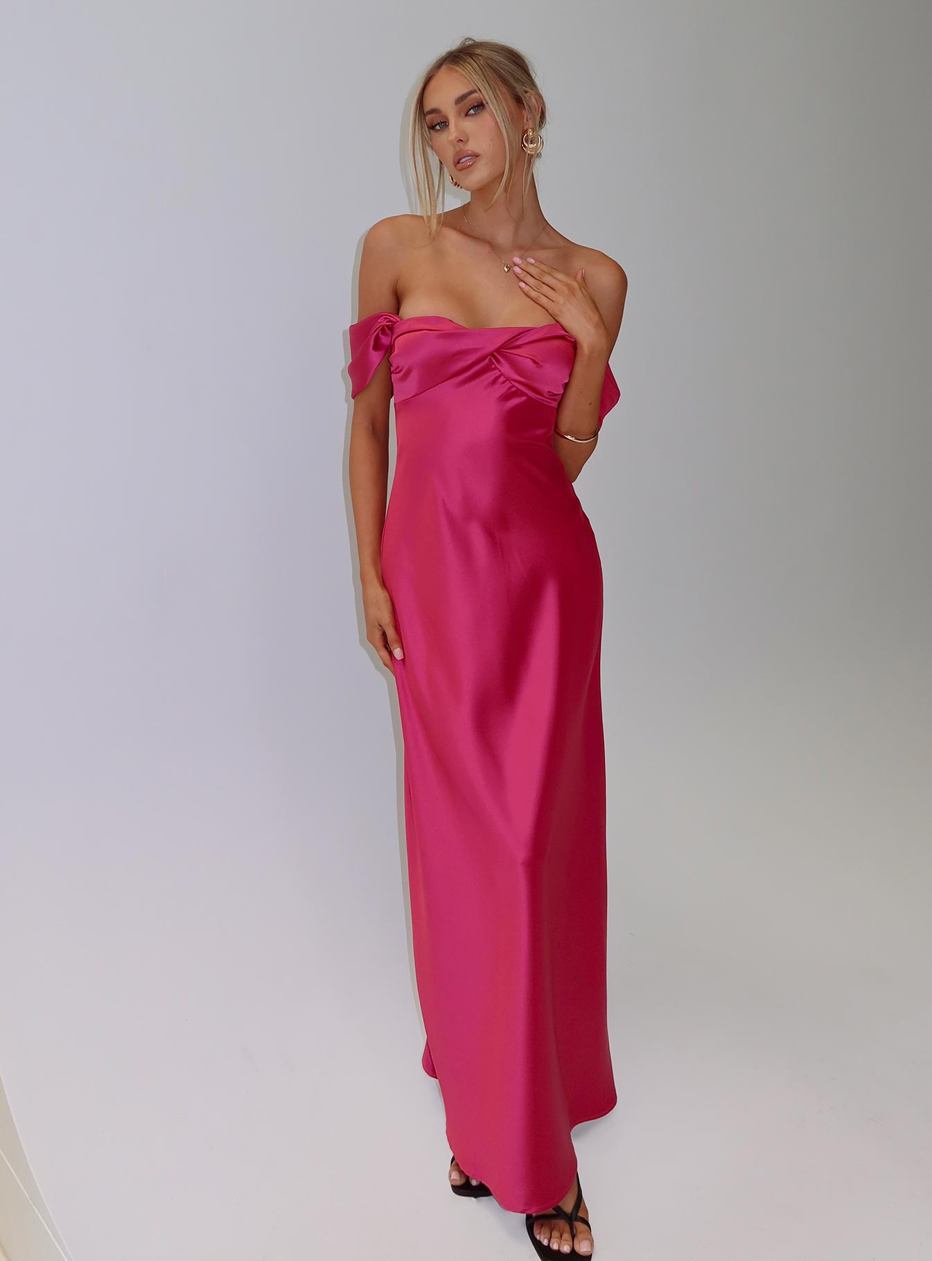 back view of model wearing Princess Polly Live For You Off The Shoulder Maxi Dress Hot Pink Sweetheart Neckline 