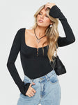 front view of model wearing Princess Polly Kirsta Long Sleeve Bodysuit Black Full Sleeves Scoop Neck 