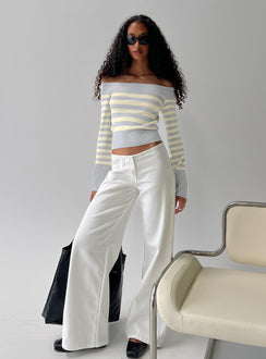 front view of model wearing Princess Polly Hereos Mid Rise Baggy Leg Jeans White Mid Rise Jeans 