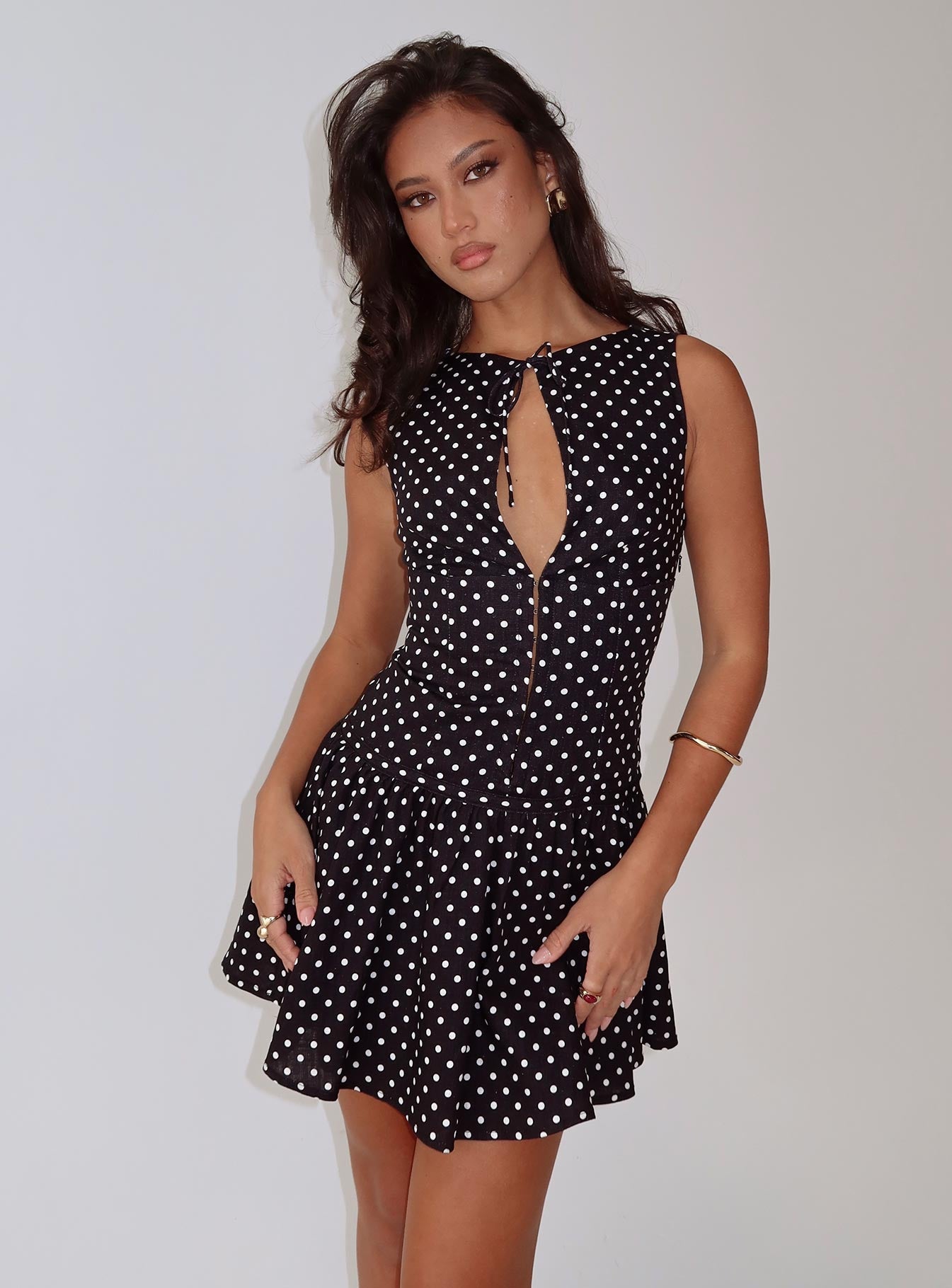 side view of model wearing Princess Polly Alissea Keyhole Linen Blend Mini Dress Black Polka Crew Neck 