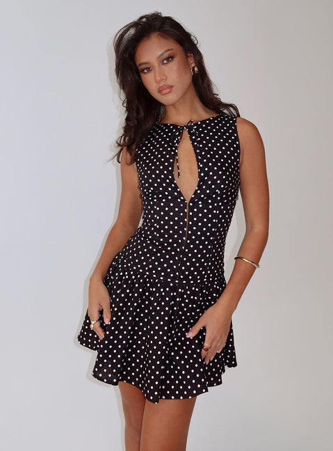side view of model wearing Princess Polly Alissea Keyhole Linen Blend Mini Dress Black Polka Crew Neck 
