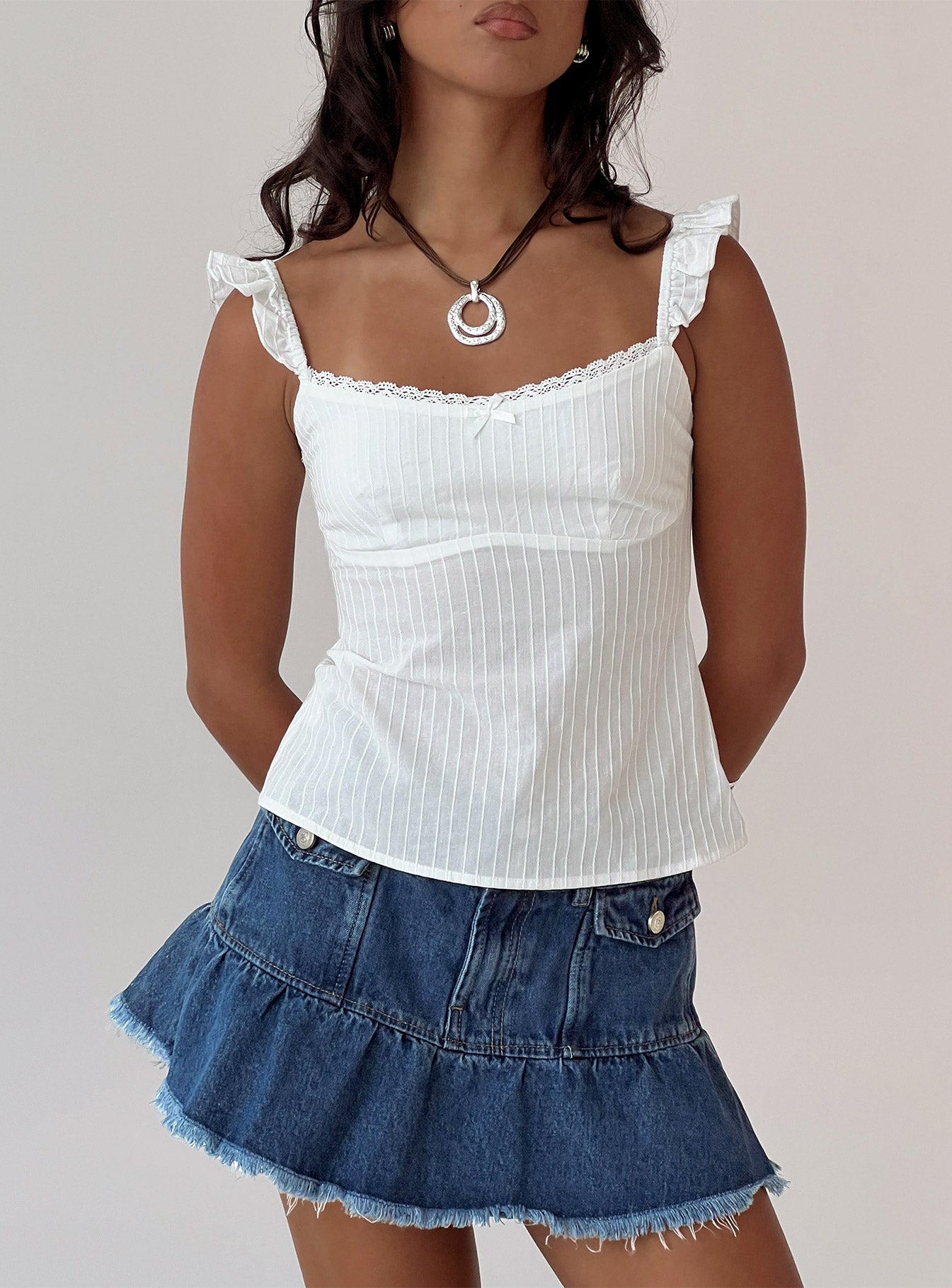 front view of model wearing Princess Polly Madaleine Top White Sleeveless Scoop Neck 