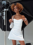 front view of model wearing Princess Polly Bradwell Strapless Mini Dress White Sweetheart Neckline 