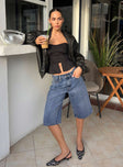 front view of model wearing Princess Polly Kurt Denim Culottes Acid Wash Low Rise Shorts 