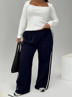 front view of model wearing Princess Polly Circuit Track Pants Navy Curve 
