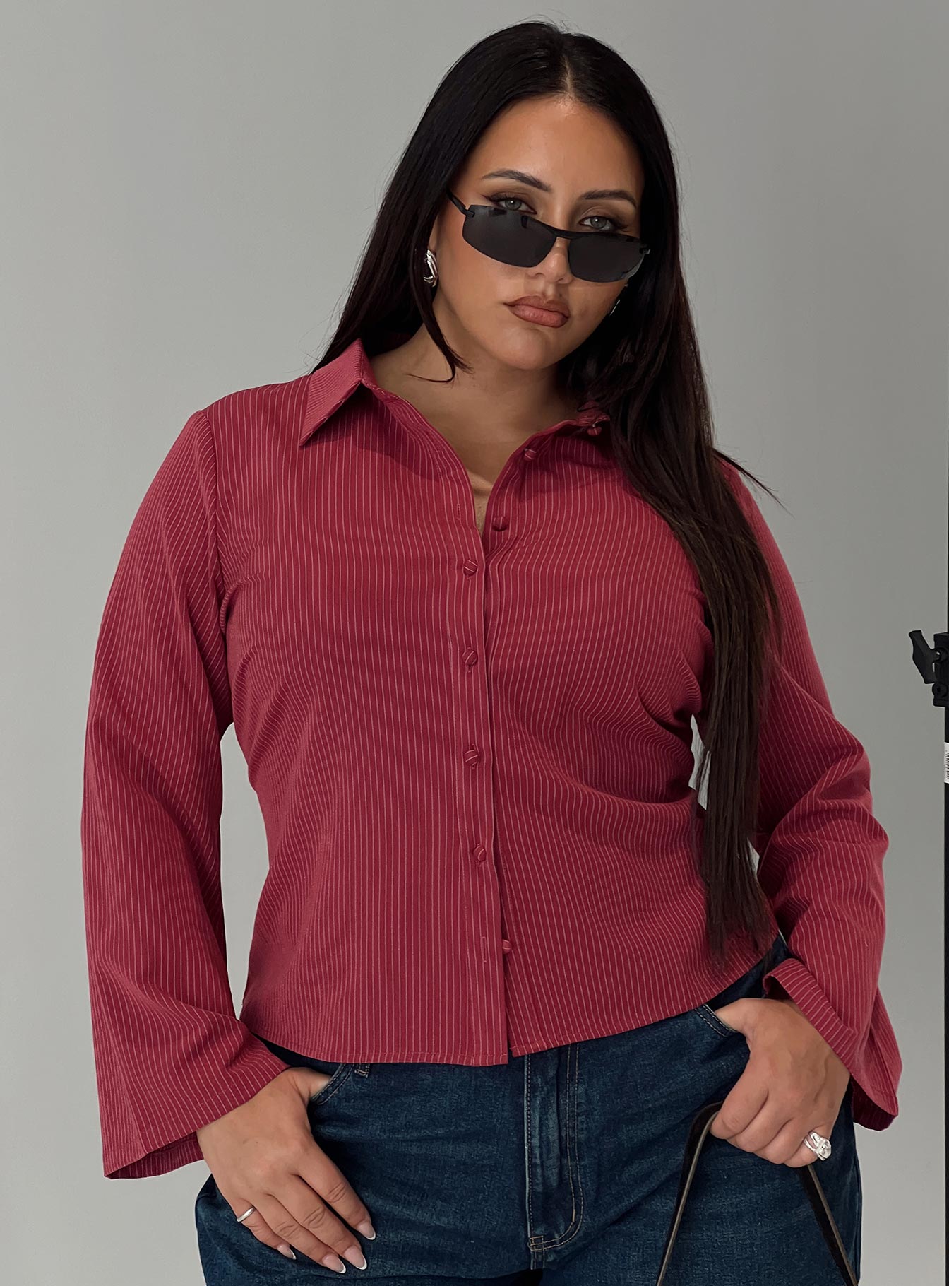 front view of model wearing Princess Polly Anni Pinstripe Shirt Red Curve Full Sleeves V-Neck 