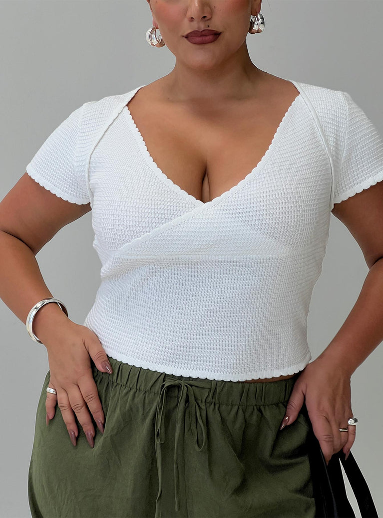 front view of model wearing Princess Polly Maz Top White Curve Short Sleeves Plunger 