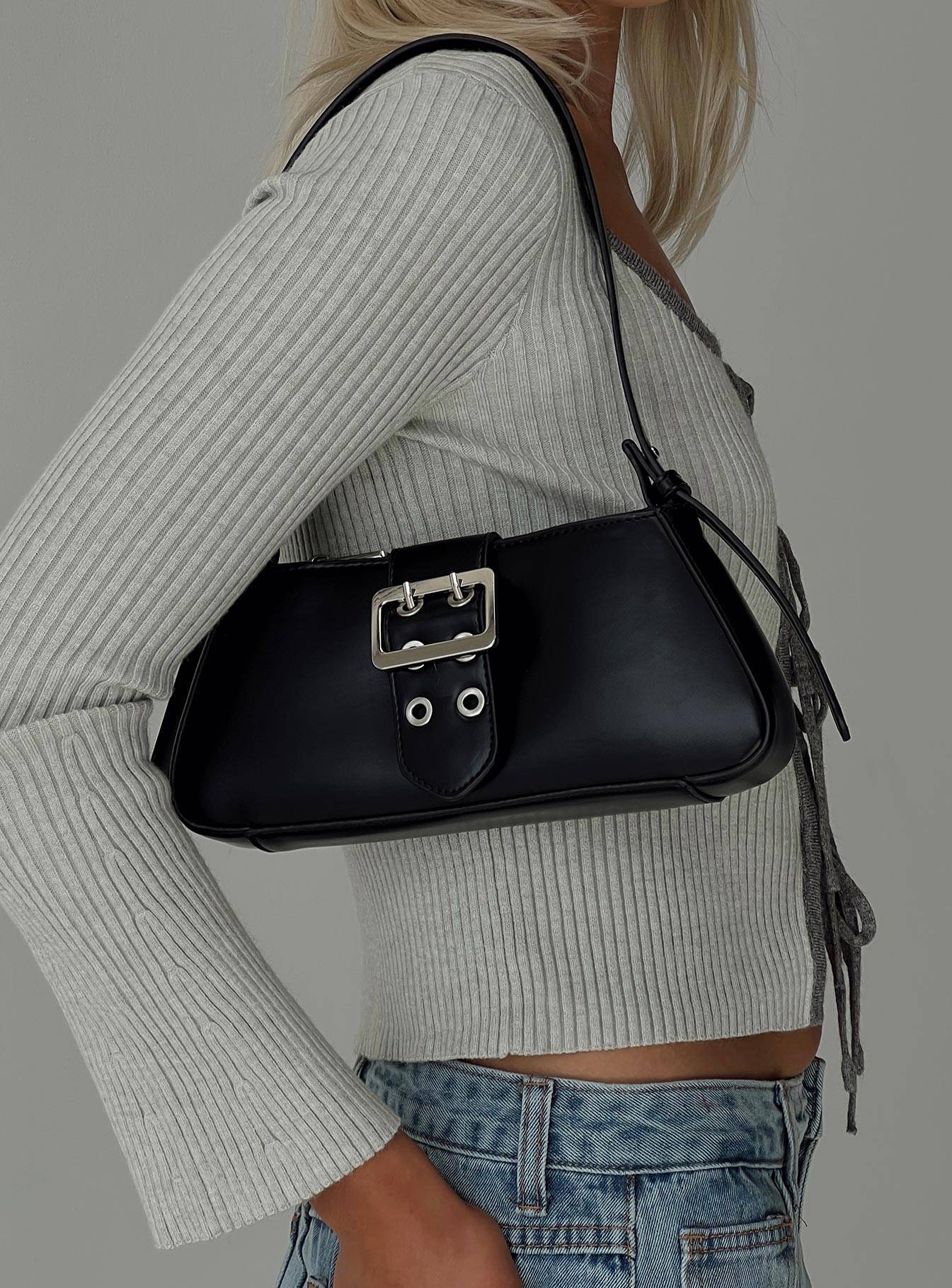 Shoulder bag Press button fastening, buckle detail, zip fastening, internal slip pocket, flat base, adjustable & removable strap