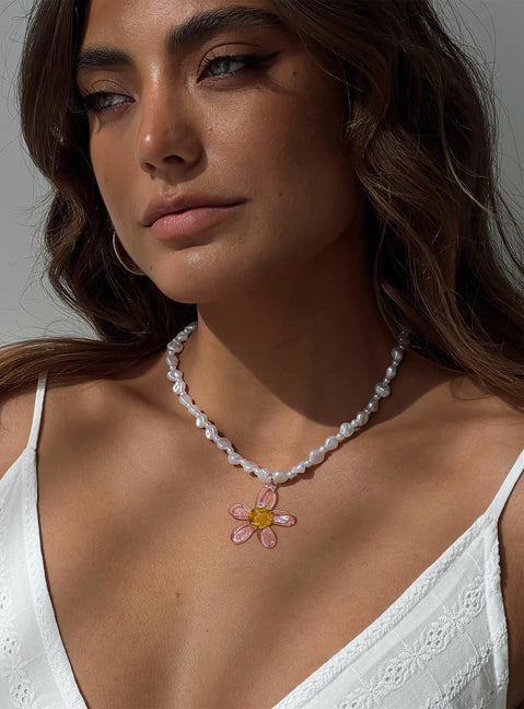 Gold-toned necklace Pearl detail, lobster clasp fastening, flower pendant