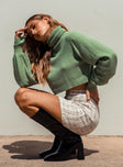 side view of model wearing Princess Polly Zahara Cropped Turtleneck Sweater Green Petite Cropped 