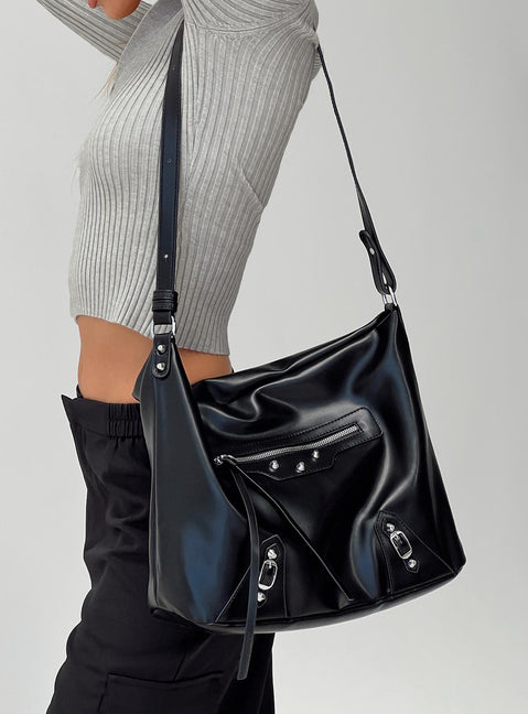 Faux leather shoulder bag Silver-toned hardware, adjustable shoulder strap, zip fastening, internal zip & slip pockets, flat base, external zip pocket