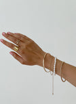 Gold-toned bracelet pack Four separate bracelets, chain and bangle style, pearl detail, lightweight 