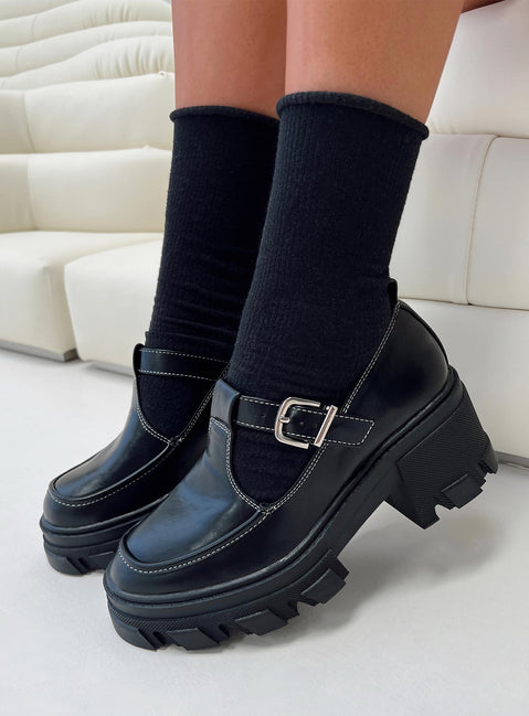 Mary jane heels  Faux leather single strap upper, contrast stitching, treaded sole, platform style, buckle fastening with silver-toned hardware