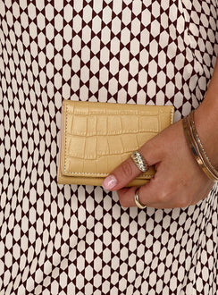 Cardholder Faux leather material  Croc print  Press button fastening  Multiple internal compartments 