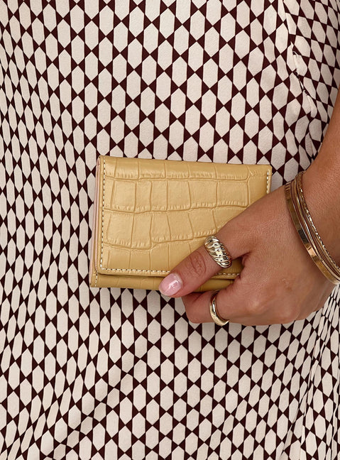 Cardholder Faux leather material  Croc print  Press button fastening  Multiple internal compartments 