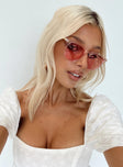 Sunglasses Rounded frame Lightweight design Pink tinted lenses Moulded nose bridge Metal arms