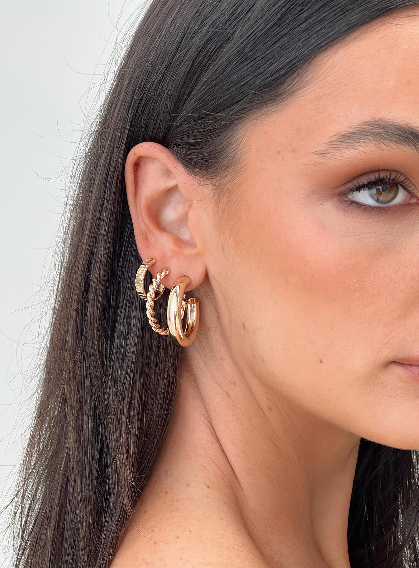 Gold-toned earring pack Set of 3 pairs, hoop design, stud fastening