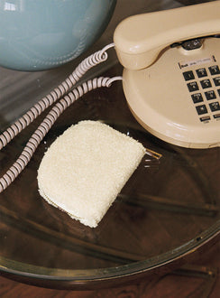 Coin purse  Fluffy outer material, four x card inserts, one middle zip compartment, extra padding sturdy outer