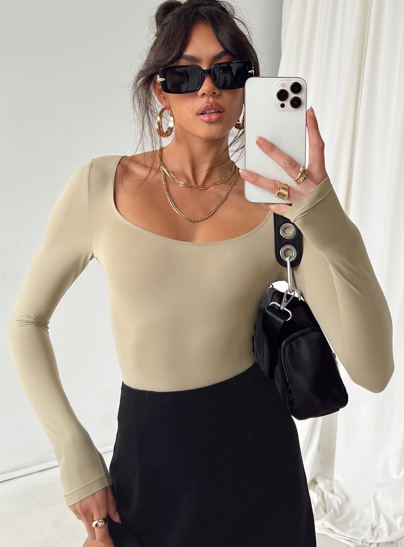 front view of model wearing Princess Polly Mallard Bodysuit Brown Petite Full Sleeves 