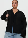 front view of model wearing Princess Polly Selma Shirt Black Curve Full Sleeves V-Neck 