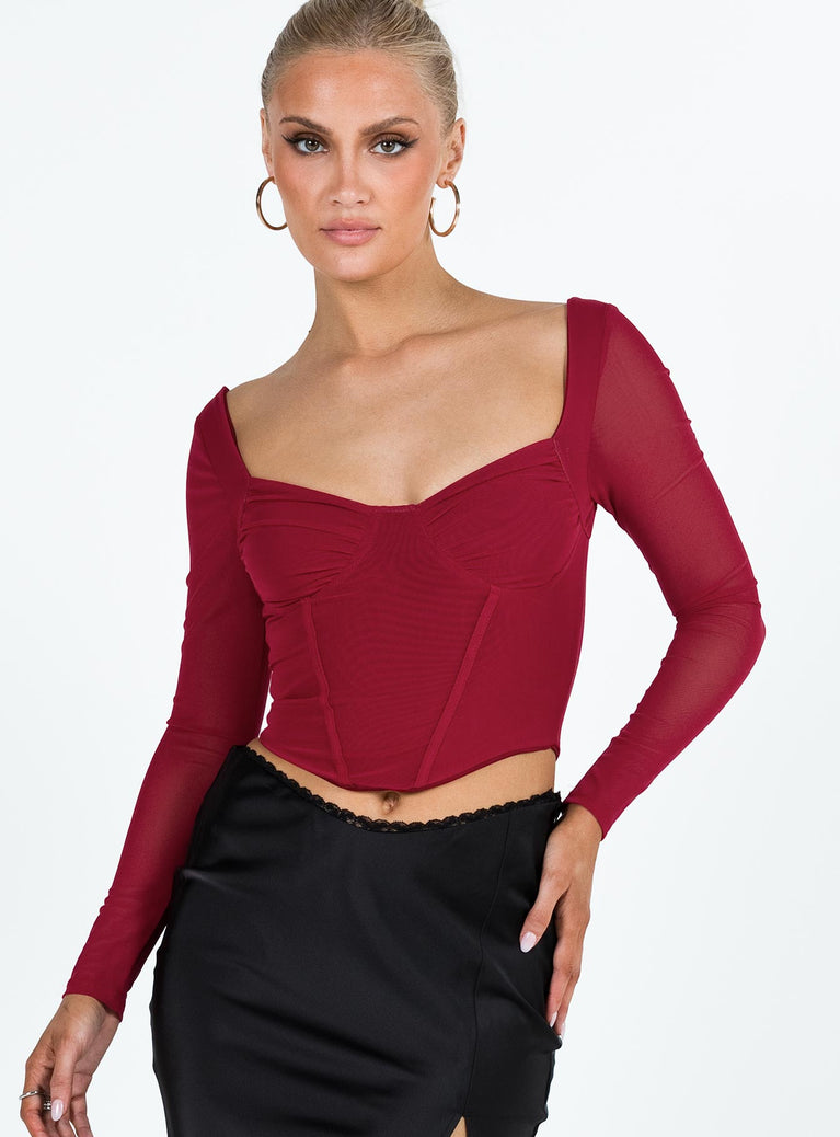 front view of model wearing Princess Polly Bruna Top Long Sleeve Red Lower Impact Full Sleeves Sweetheart 