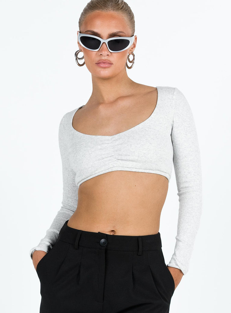 Long sleeve crop top V neckline Pinched detail at bust Good stretch Lined body