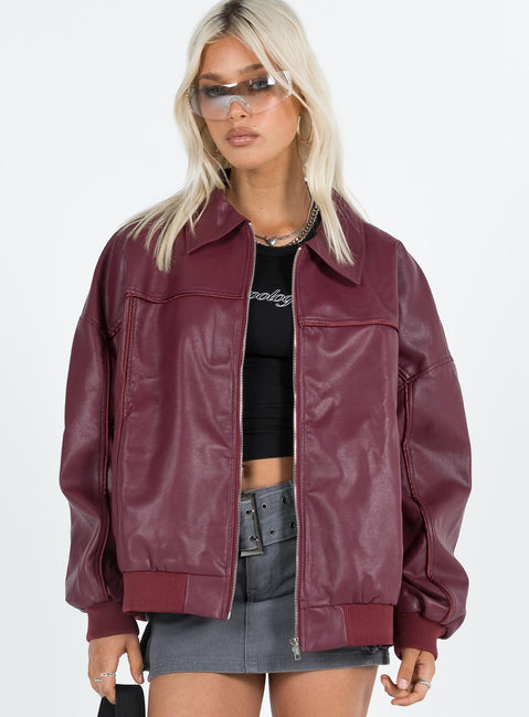 Burgundy bomber jacket Faux leather material  Classic collar  Zip front fastening  Ribbed waistband and cuffs  Twin hip pockets