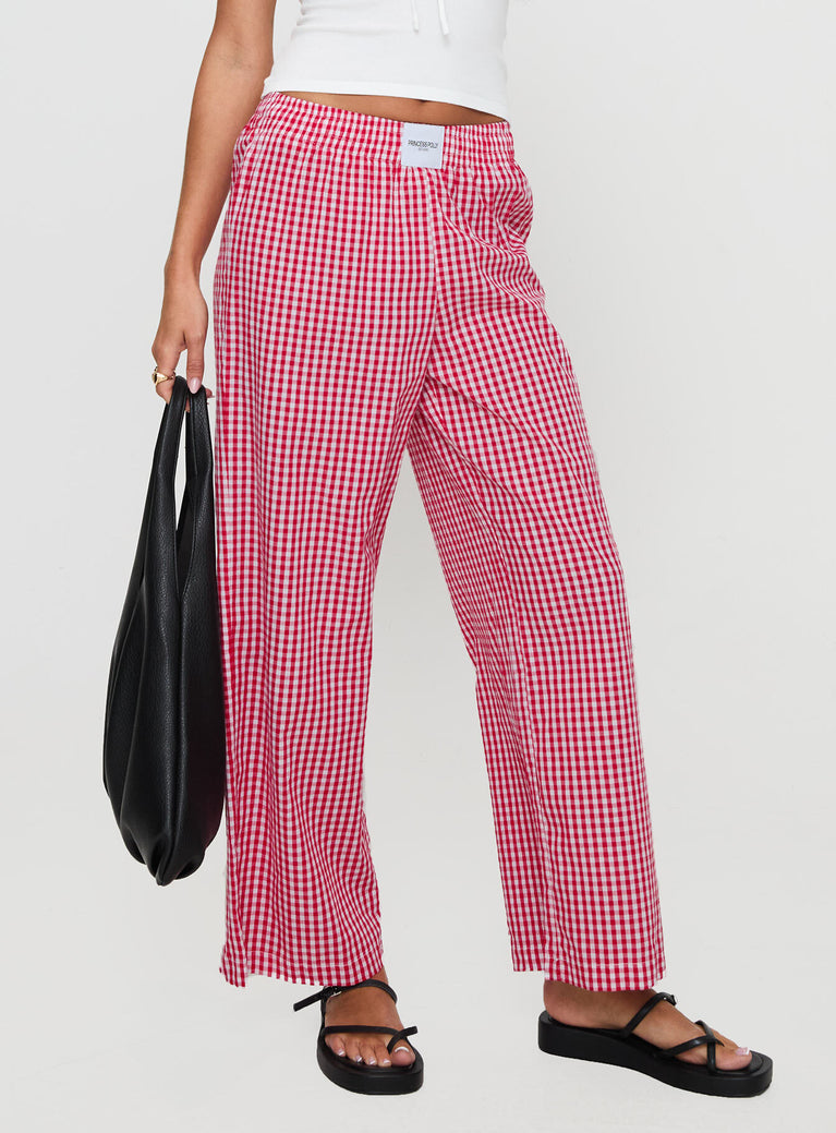 back view of model wearing Princess Polly Beach House Pants Red Gingham High Waisted Pants 