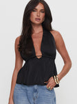 front view of model wearing Princess Polly Saddler Halter Top Black Sleeveless Plunger 