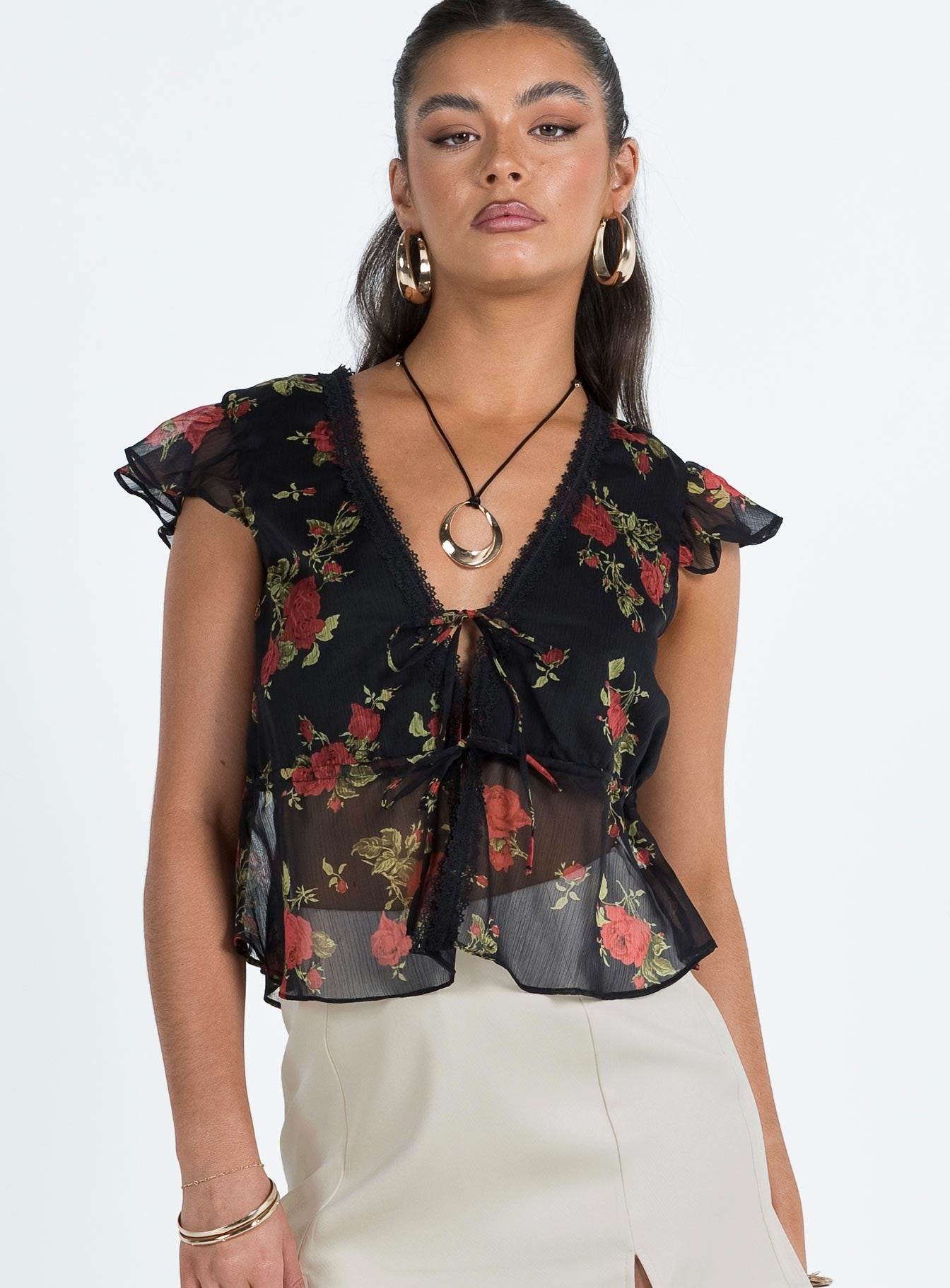 Front view of model wearing  front Princess Polly Short Sleeves V-Neck  Wiley Top Black Floral