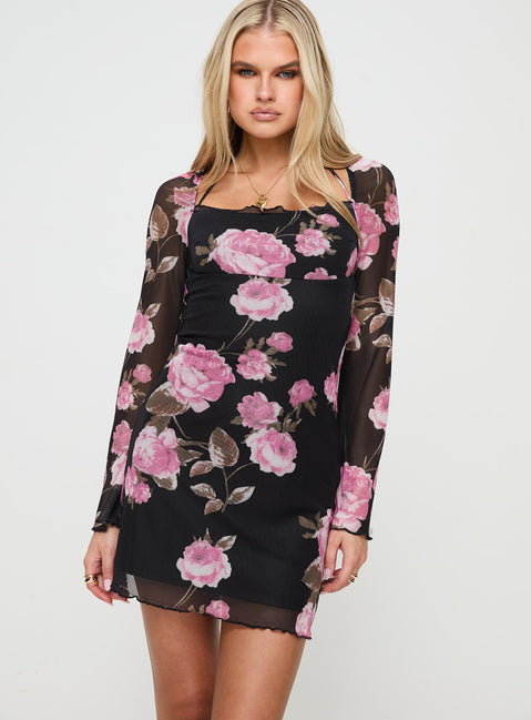 front view of model wearing Princess Polly Bilbao Long Sleeve Mini Dress Black / Floral Square Neck 