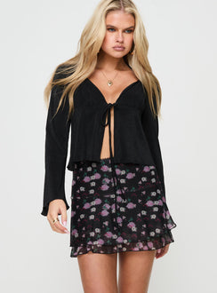   front view of model wearing Princess Polly Sunny Skies Mini Skirt Black Floral Mini Skirts 