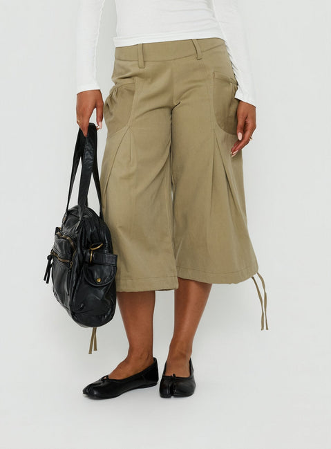 Featuring the Iria Capri Trouser Khaki womens-regular-pants with mid-rise waist detail Princess Polly