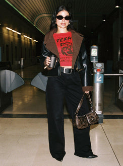 front view of model wearing Princess Polly Jankins Baggy Jeans Black Mid Rise 