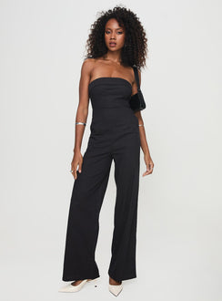 Strapless jumpsuit Inner silicone strip at bust, invisible zip fastening, fold at bust, straight leg fit Non-stretch material, unlined 