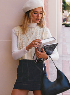 back view of model wearing Princess Polly Hughes Mini Skirt Dark Wash Denim Petite Mini Skirts 