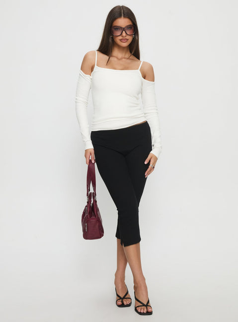 front view of model wearing Princess Polly Baseline Rib Capri Pants Black High Rise Pants 