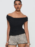 front view of model wearing Princess Polly Sonnie Off Shoulder Top Black Short Sleeves Cowl 