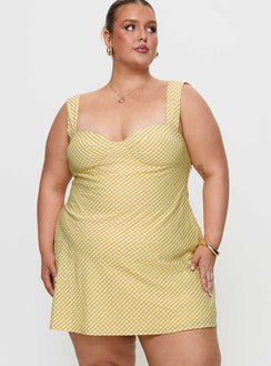 back view of model wearing Princess Polly Mcbeath Mini Dress Yellow Curve Sweetheart Neckline 