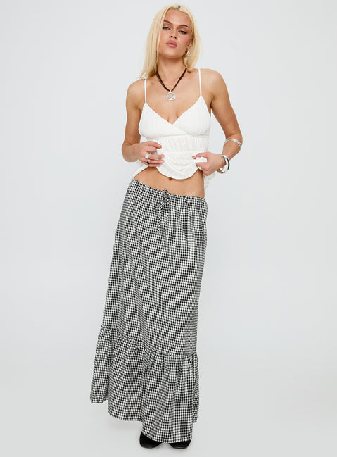   side view of model wearing Princess Polly Modern Girl Maxi Skirt Black / White Gingham Maxi 