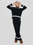 front view of model wearing Princess Polly Montenegro Knit Pants Black / Cream 