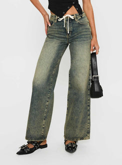 front view of model wearing Princess Polly Mellowed Out Slouchy Jeans Antique Wash Mid Rise 