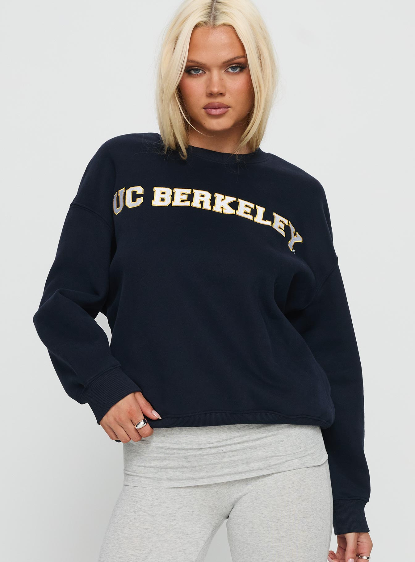 front view of model wearing Princess Polly UC Berkeley Offside Crewneck Sweatshirt Navy 