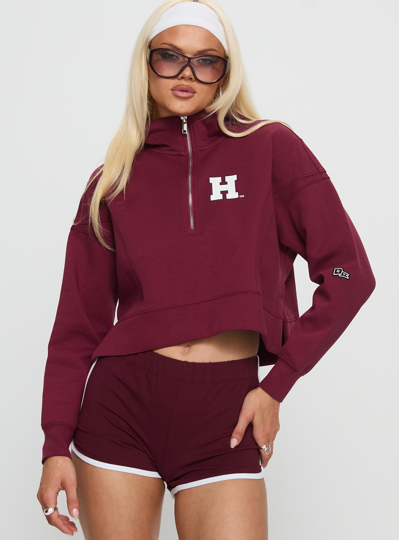 front view of model wearing Princess Polly Harvard Buttersport Half-zip Hoodie Crimson cropped 