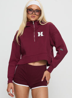 front view of model wearing Princess Polly Harvard Buttersport Half-zip Hoodie Crimson cropped 