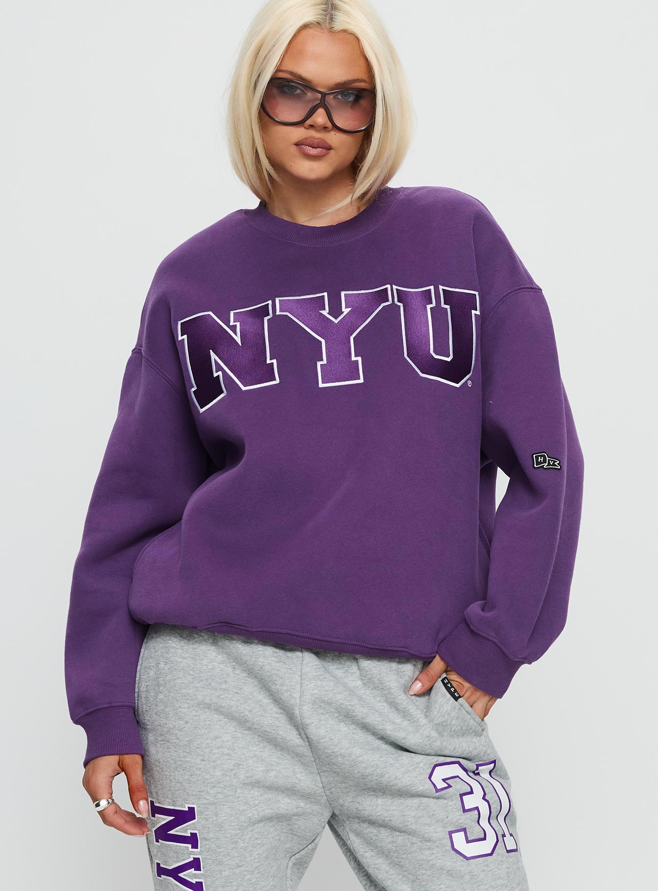 front view of model wearing Princess Polly NYU Offside Crewneck Sweatshirt Purple 