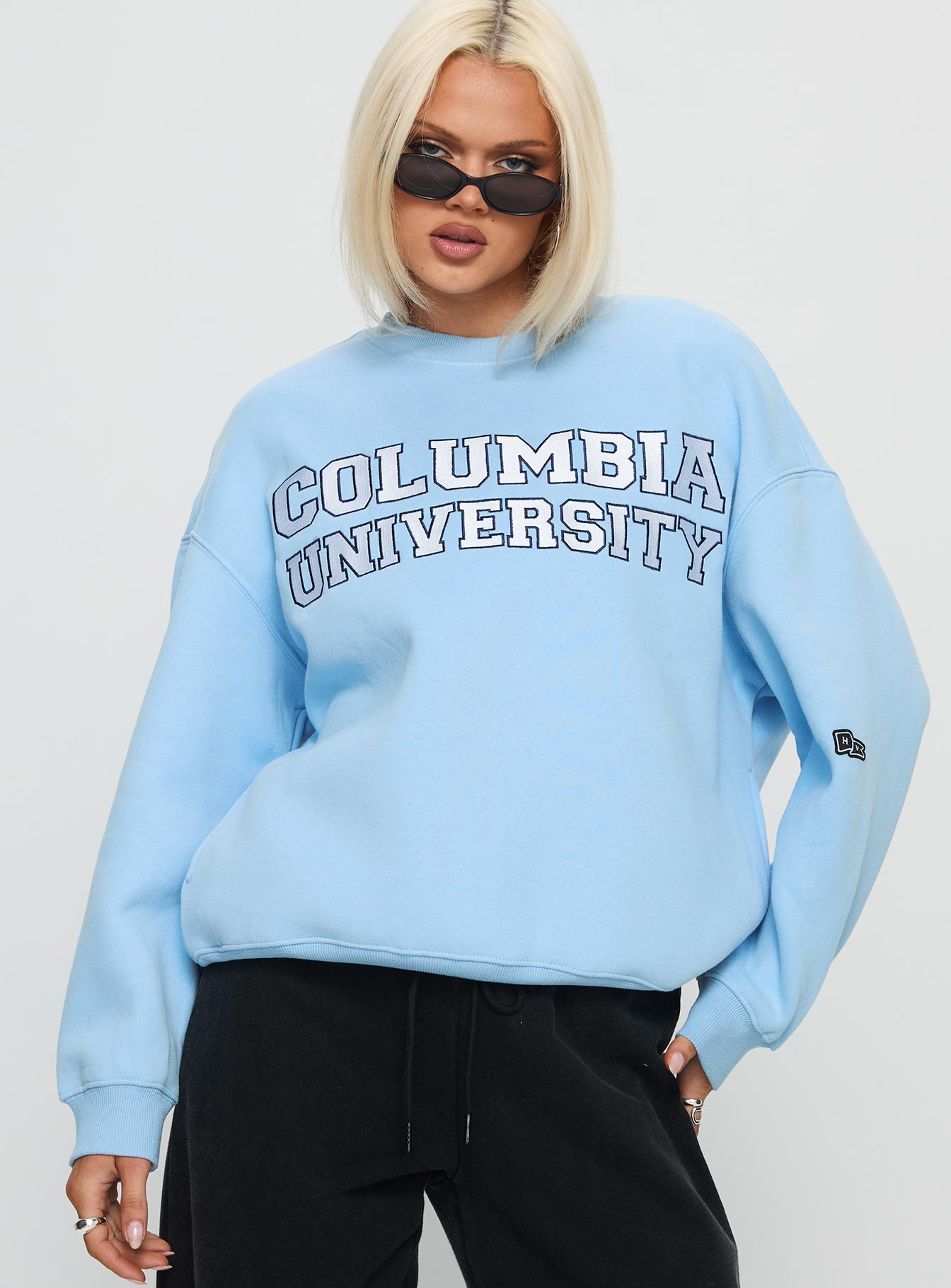 front view of model wearing Princess Polly Columbia Offside Crewneck Sweatshirt Blue Long 