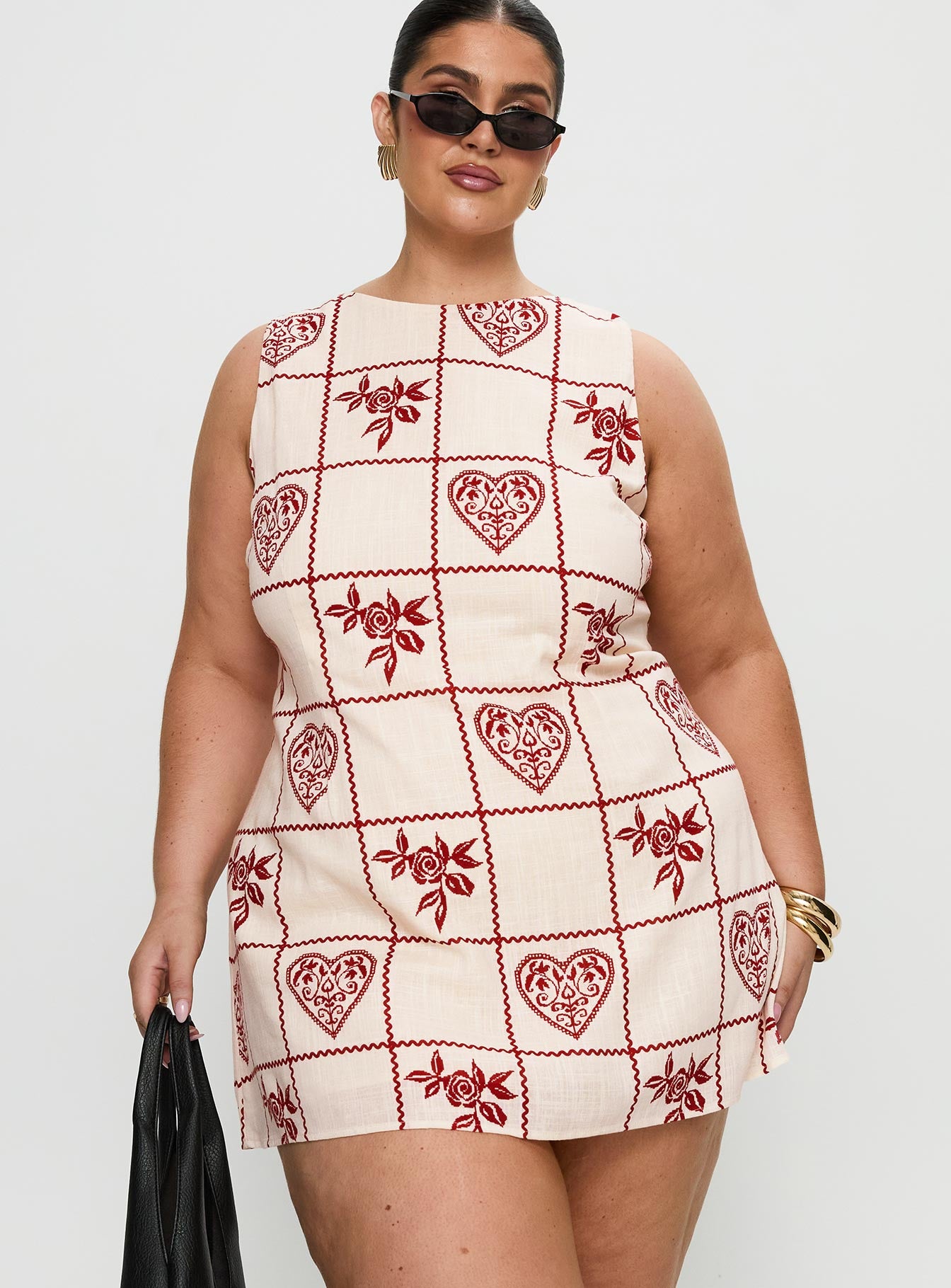 front view of model wearing Princess Polly Alfalfa Shift Mini Dress Red Floral Check Curve Crew Neck 