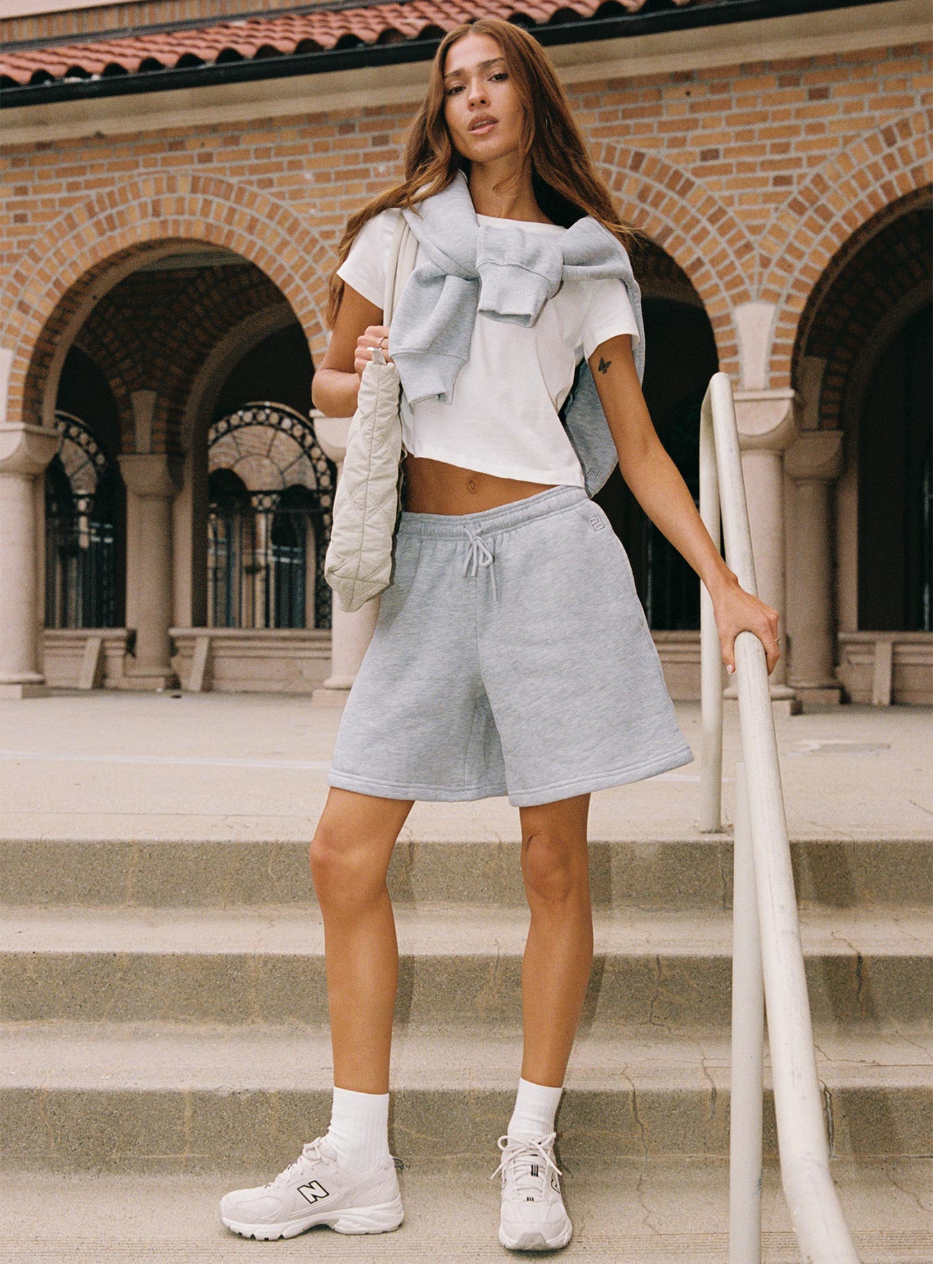 front view of model wearing Princess Polly Dream Fleece Longline Shorts Grey Marle High Waisted Shorts 